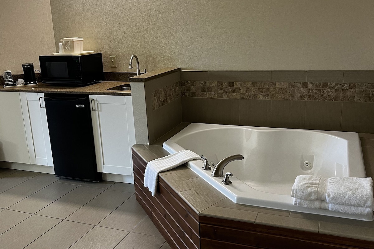 desk, laptop workspace, blackout curtains, iron/ironing board