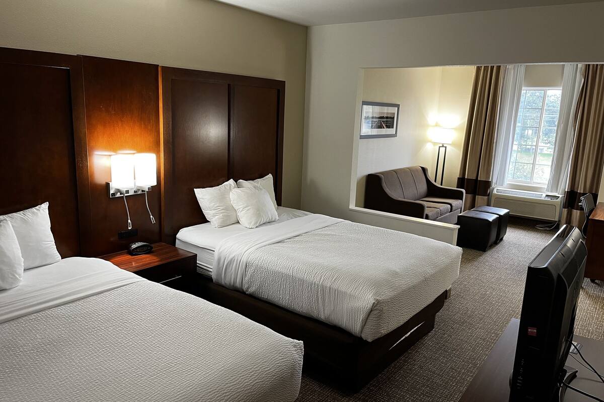 suite, 2 queen beds and sofa bed | desk, laptop workspace, blackout curtains, iron/ironing board