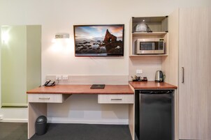 Luxury Suite, 1 King Bed, Balcony | Hypo-allergenic bedding, desk, soundproofing, iron/ironing board