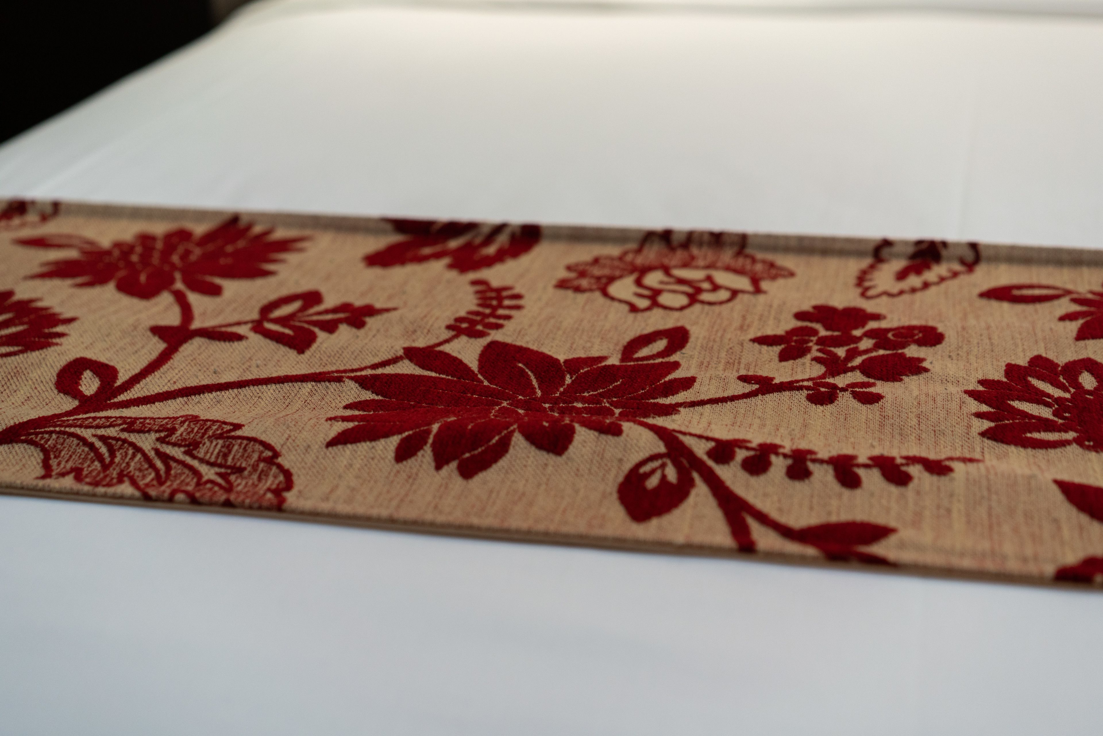 A close-up of a fabric with a floral pattern.