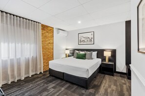 Premium bedding, pillow-top beds, blackout curtains, soundproofing