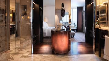 Premier Suite | Bathroom | Designer toiletries, hair dryer, bathrobes, slippers