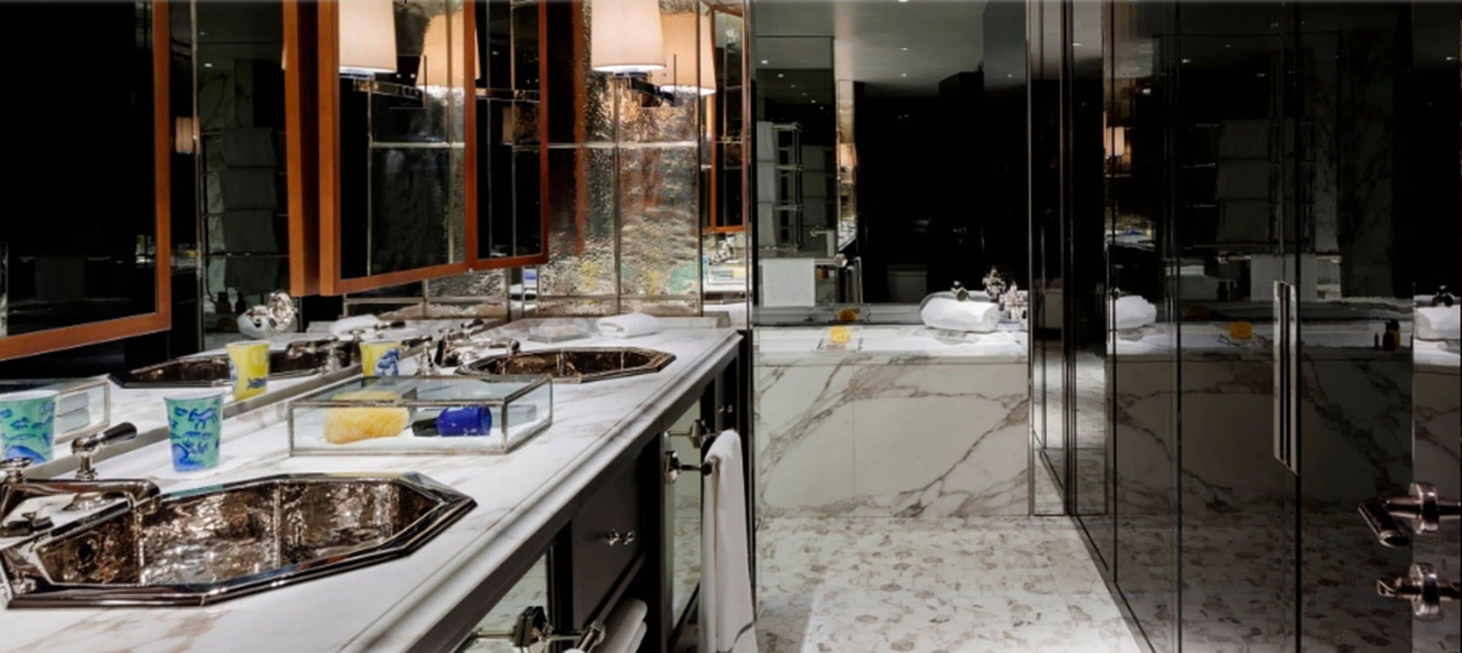 designer toiletries, hair dryer, bathrobes, slippers