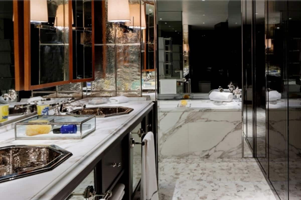 designer toiletries, hair dryer, bathrobes, slippers