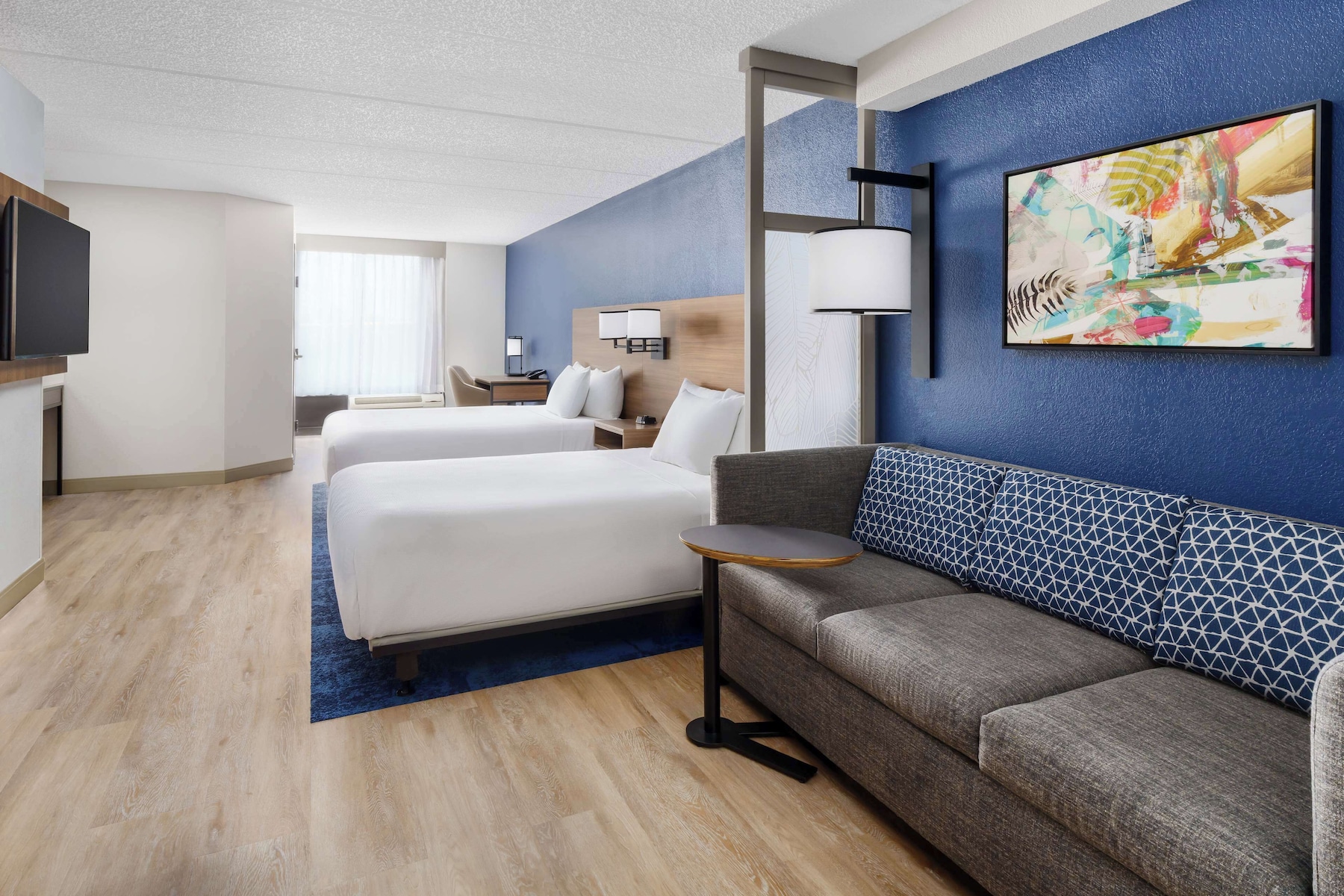 Premium bedding, down comforters, in-room safe, desk