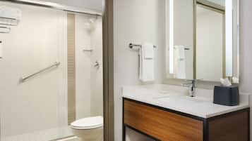 Designer toiletries, hair dryer, towels