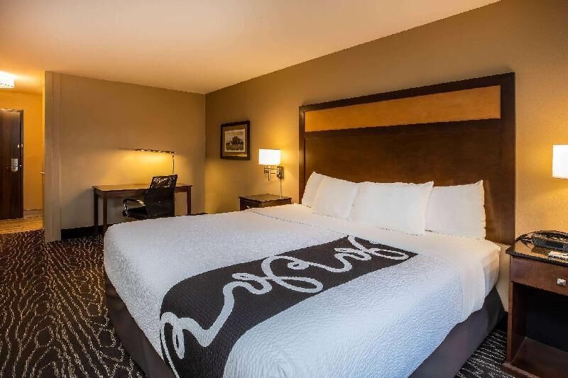 Premium bedding, pillowtop beds, desk, laptop workspace