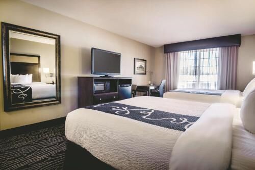 Premium bedding, pillowtop beds, desk, laptop workspace
