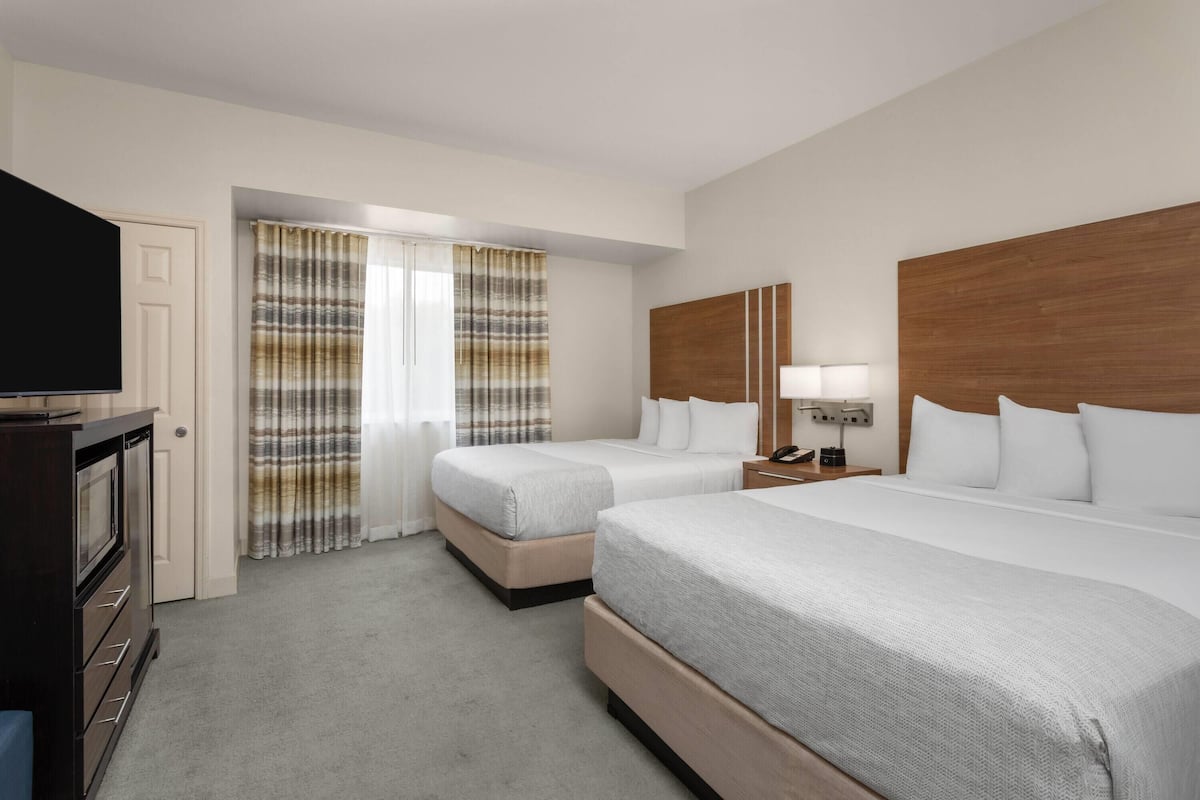 room, 2 queen beds, non smoking, pool view | 1 bedroom, hypo-allergenic bedding, pillow-top beds, in-room safe