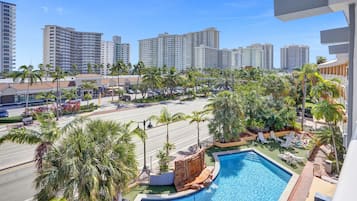 Outdoor pool, a heated pool, free cabanas, sun loungers