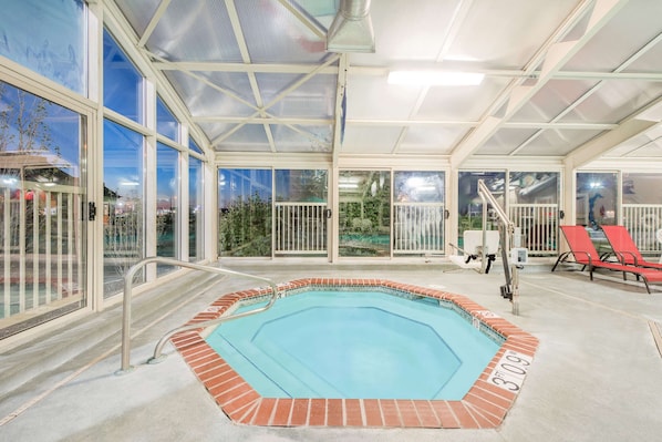 Indoor pool, open 7:00 AM to 10:00 PM, sun loungers