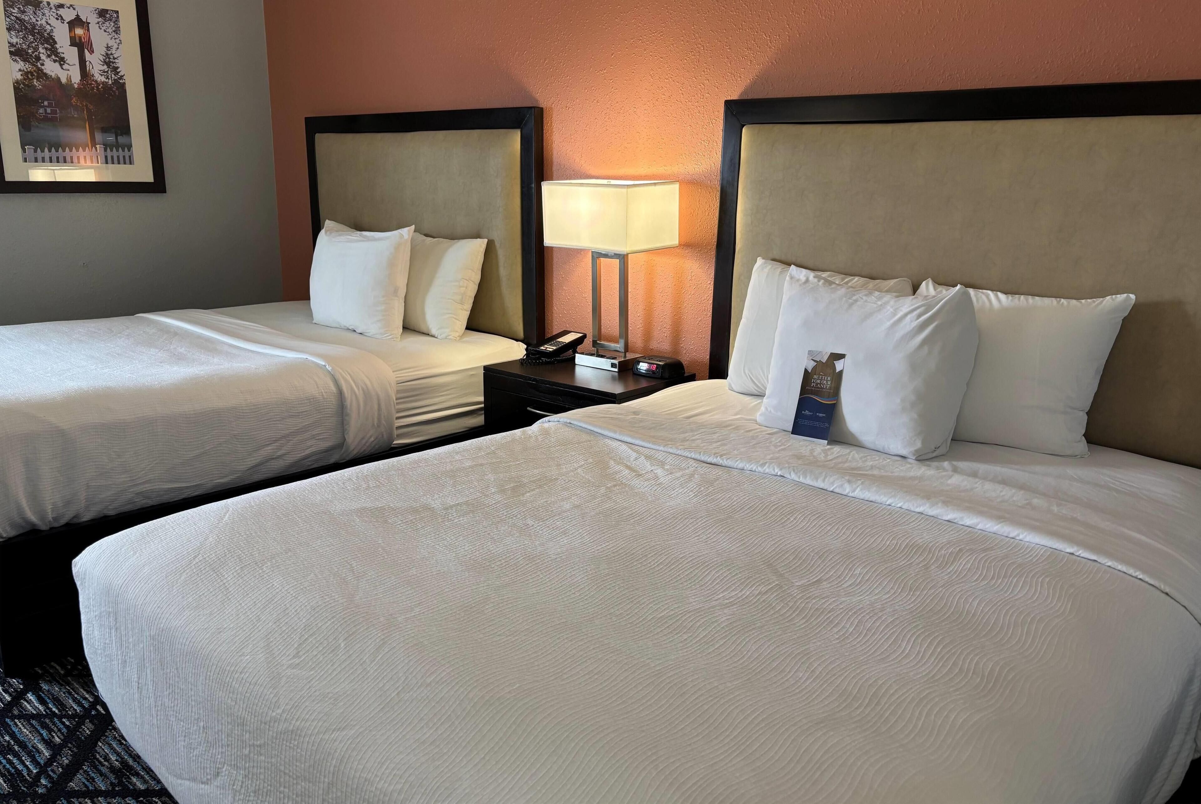 room, 2 queen beds | desk, iron/ironing board, free cots/infant beds, free wifi