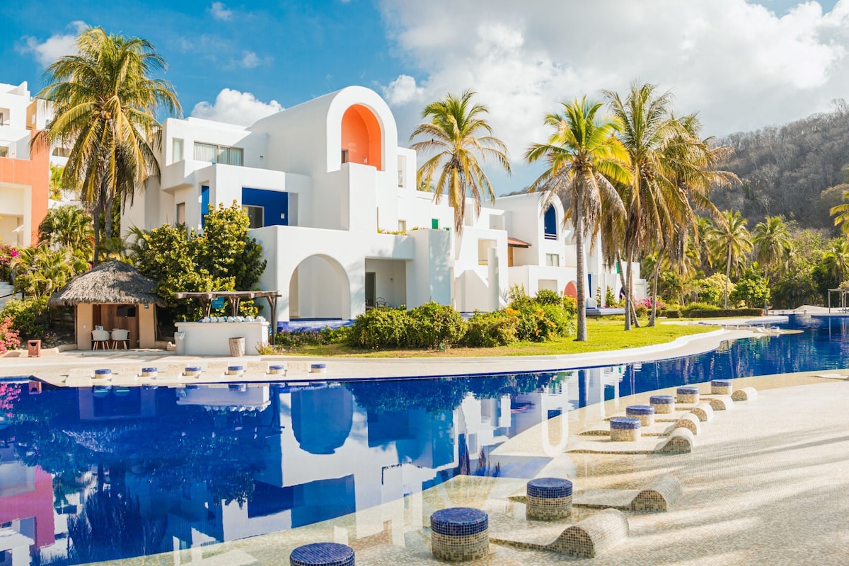 hotel pool at barcelo huatulco beach resort