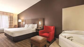 Down comforters, desk, blackout drapes, iron/ironing board