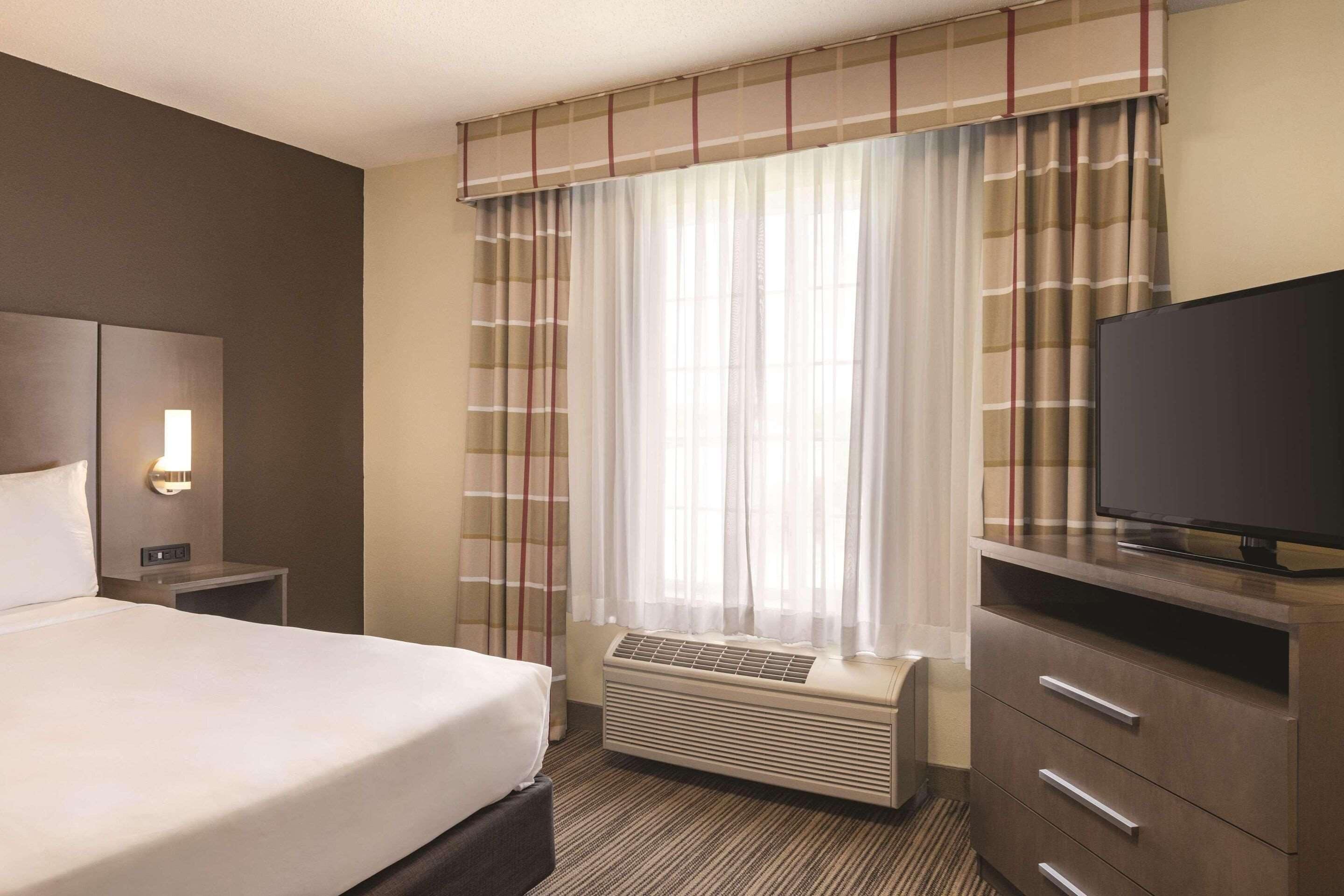 down duvets, desk, blackout curtains, iron/ironing board