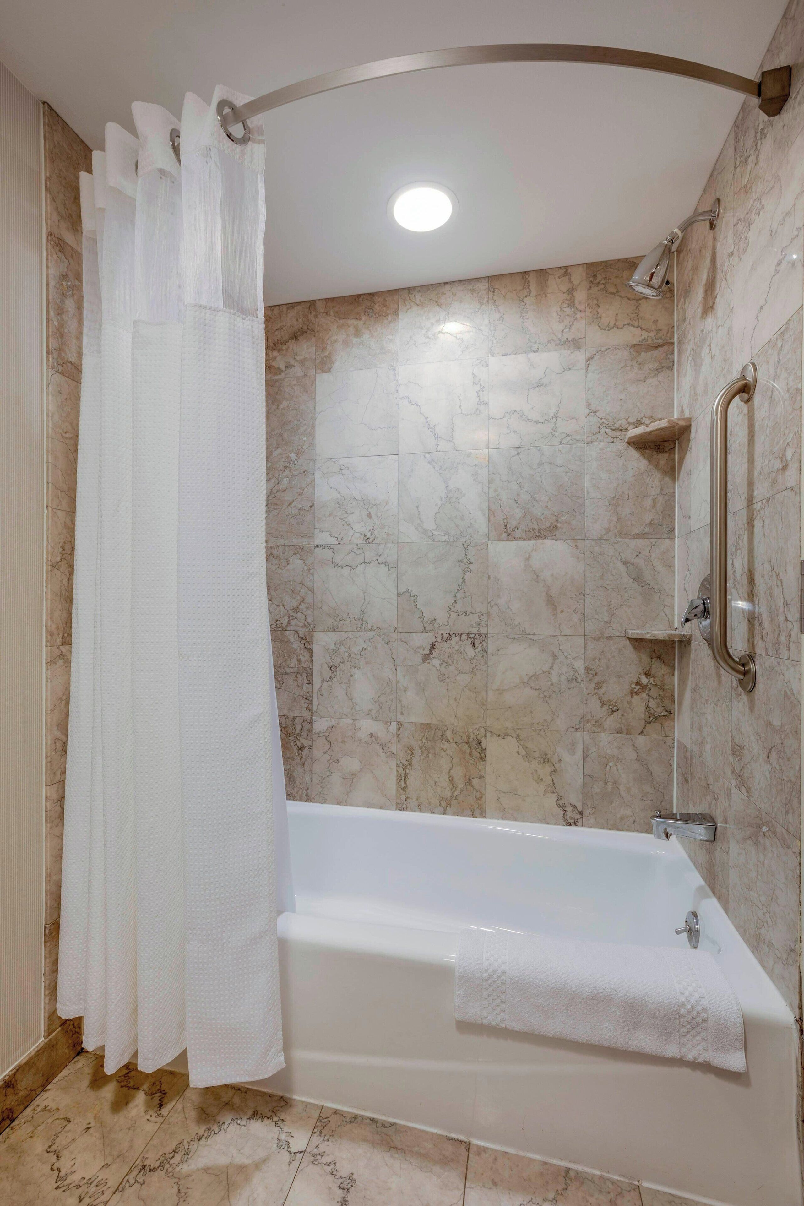 room, 2 queen beds | bathroom | combined shower/bathtub, free toiletries, hair dryer, towels