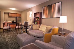 Hypo-allergenic bedding, desk, laptop workspace, blackout drapes