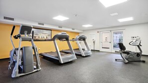 A fitness center with treadmills, an elliptical, and a stationary bike. - Holiday Inn Express Williamsburg North by IHG (Williamsburg)