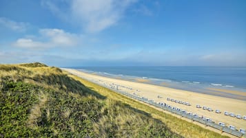 On the beach, beach towels