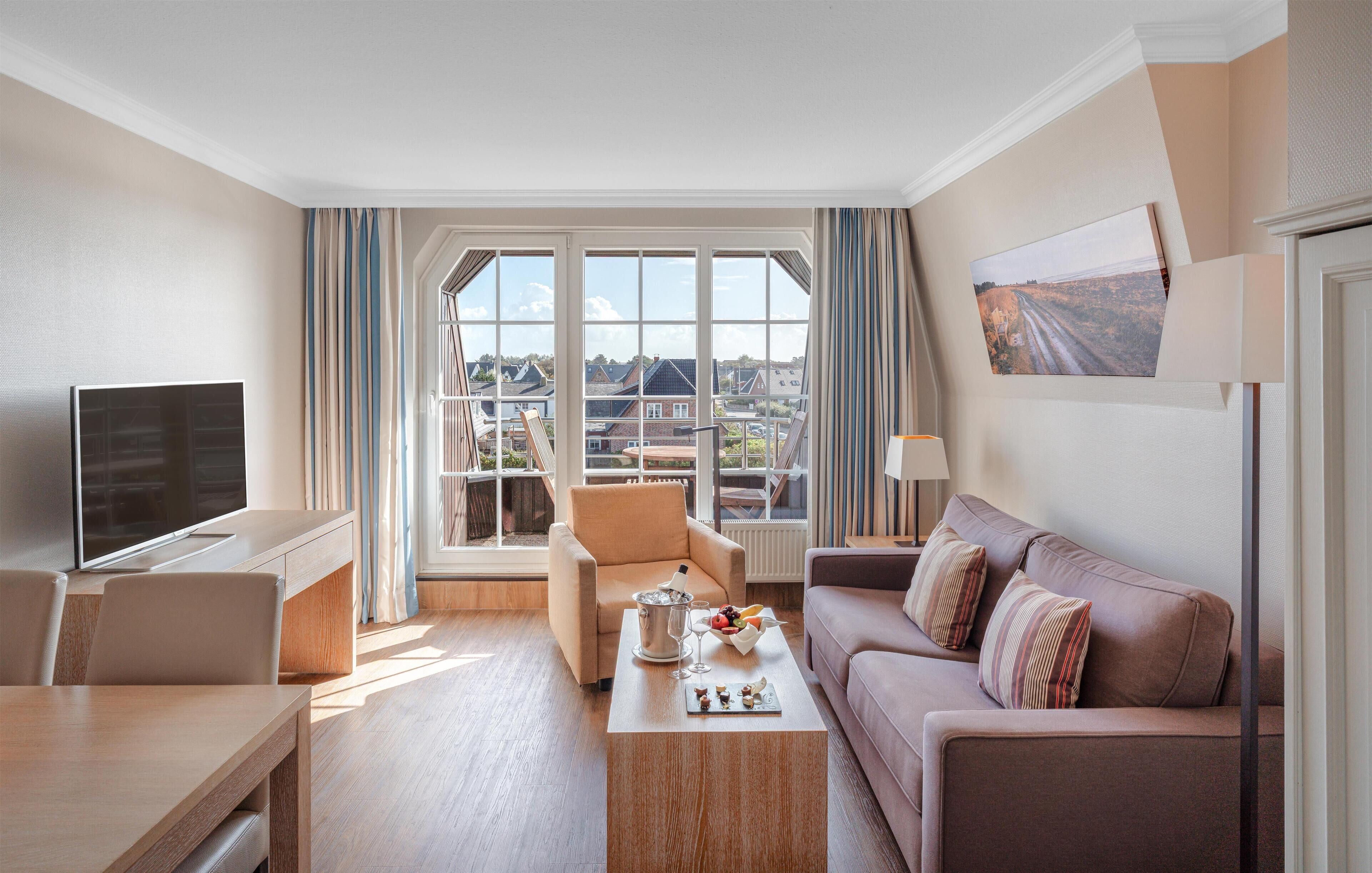 Suite Confort | Ropa de cama hipoalergénica y caja de seguridad en la habitación 