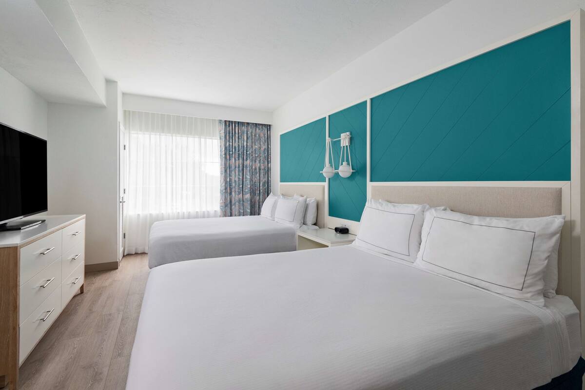 premium bedding, down duvets, pillow-top beds, in-room safe