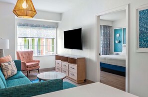 Suite, 1 King Bed, Partial View | Premium bedding, down comforters, pillowtop beds, in-room safe