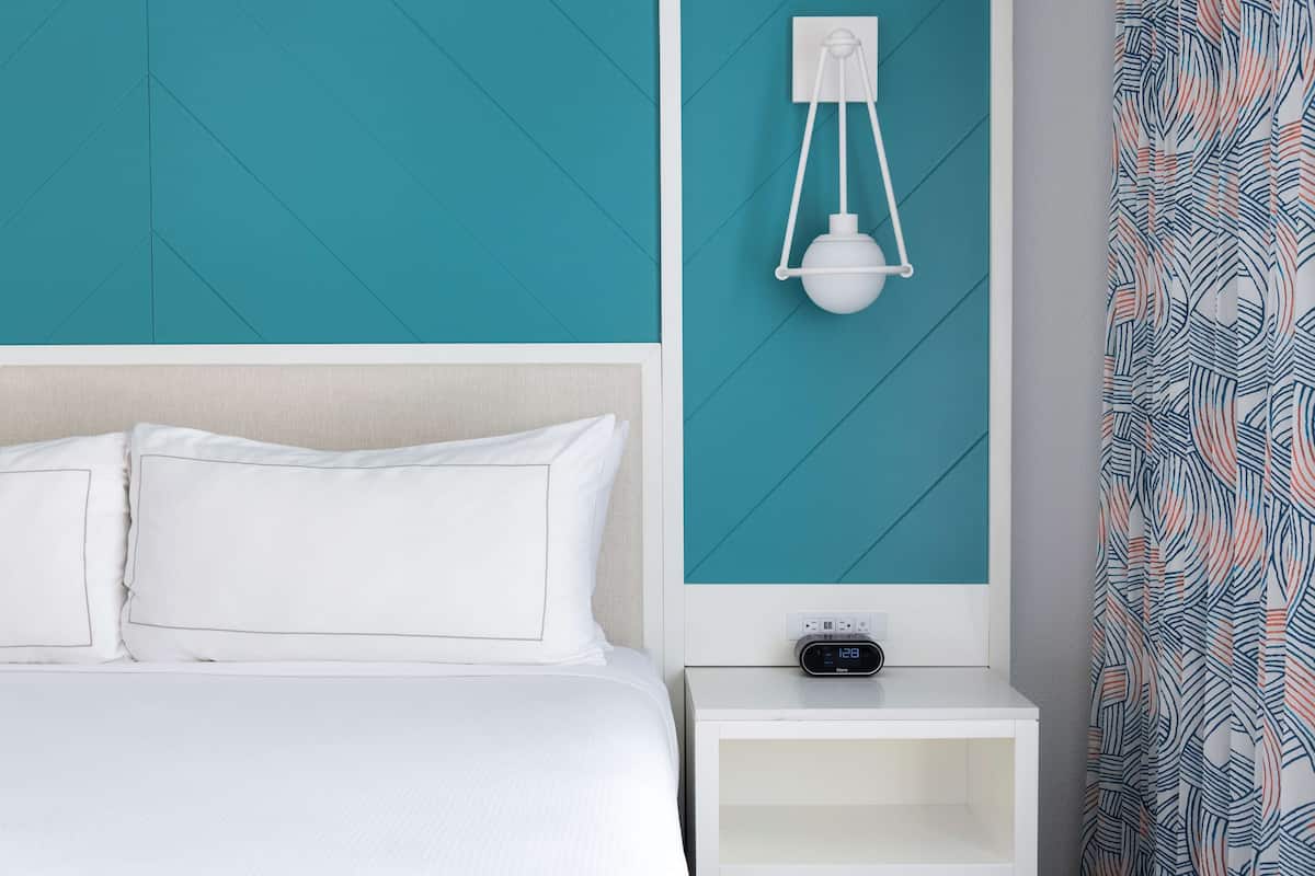 Premium bedding, down comforters, pillowtop beds, in-room safe