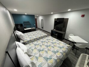Desk, laptop workspace, blackout curtains, iron/ironing board