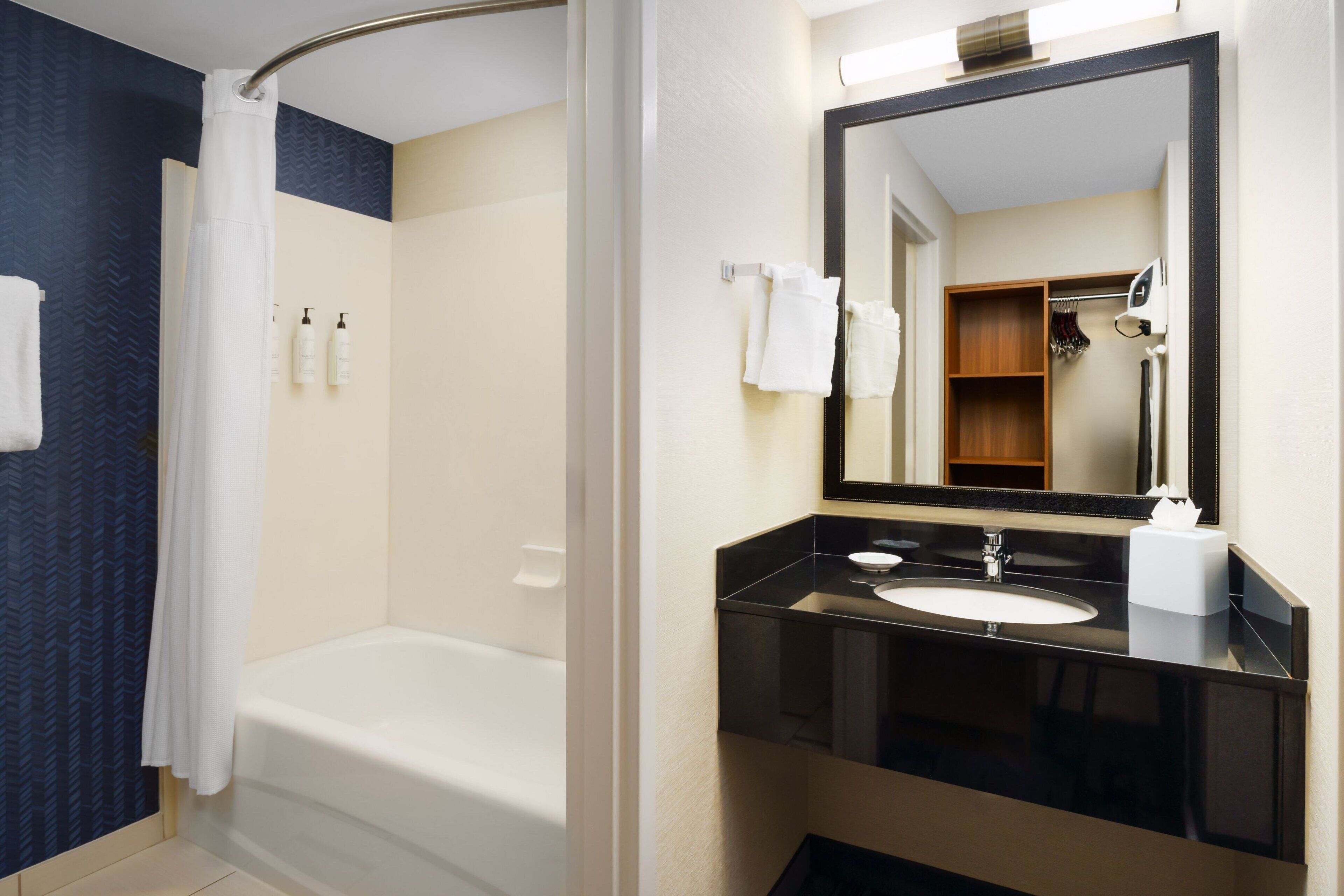 combined shower/bathtub, free toiletries, hair dryer, towels