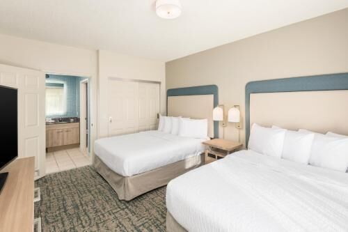 Hypo-allergenic bedding, desk, blackout drapes, soundproofing