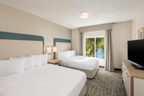 Hypo-allergenic bedding, desk, blackout drapes, soundproofing