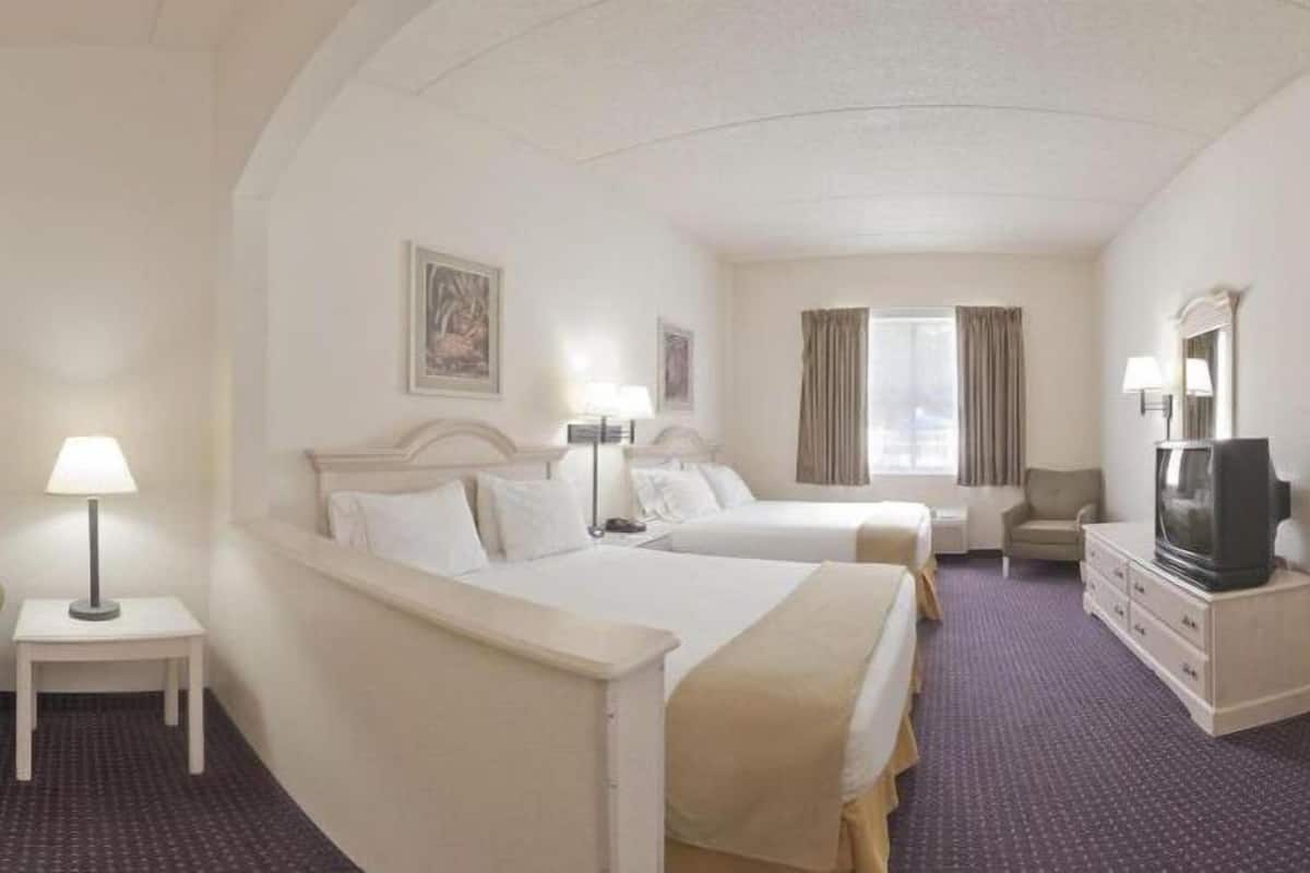 suite, 2 queen beds | 1 bedroom, in-room safe, desk, iron/ironing board