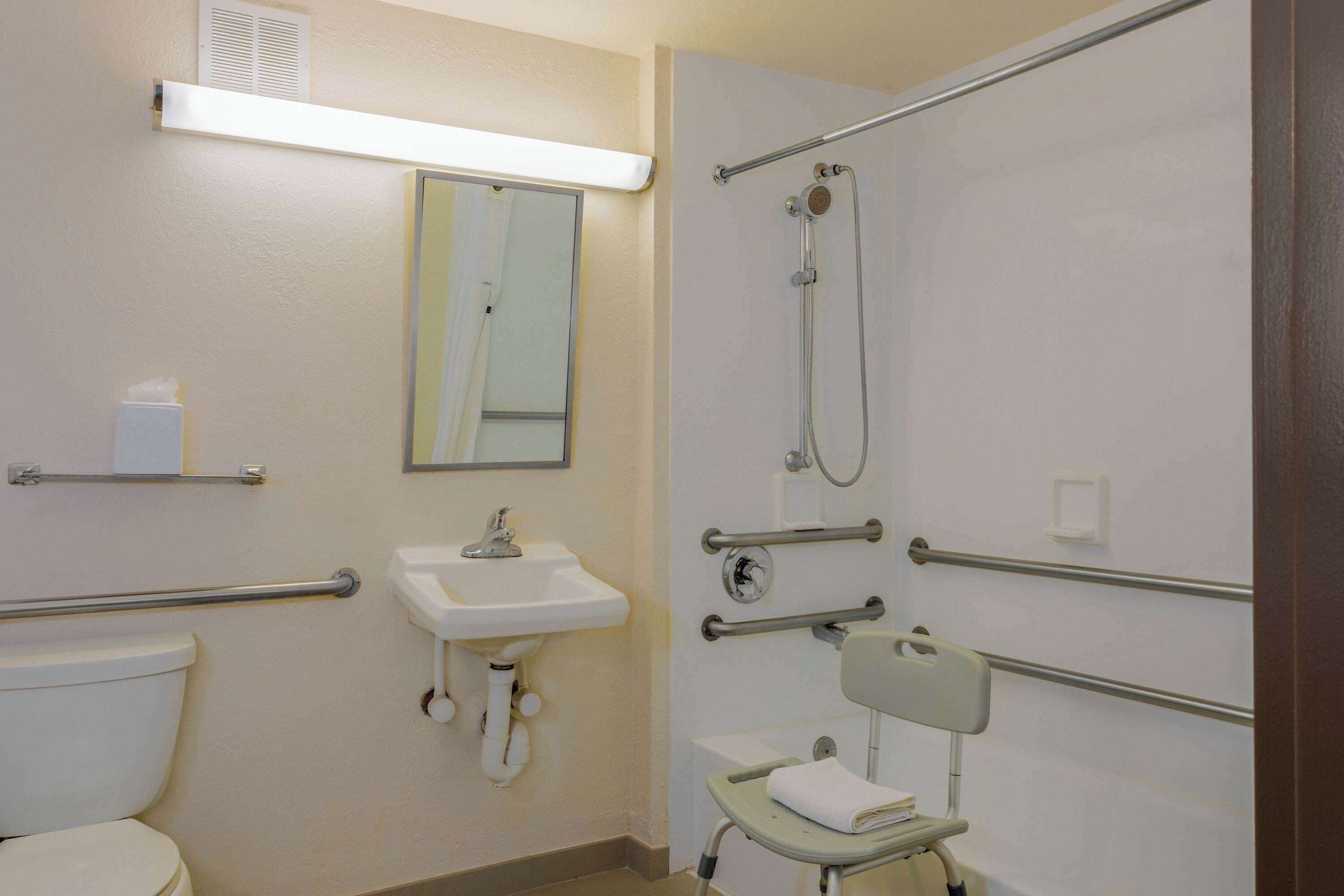 combined shower/bathtub, free toiletries, hair dryer, towels