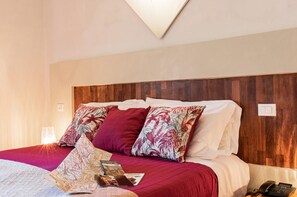Classic Double Room | Minibar, in-room safe, iron/ironing board, cribs/infant beds