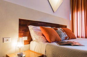 Classic Double Room | Minibar, in-room safe, iron/ironing board, cots/infant beds
