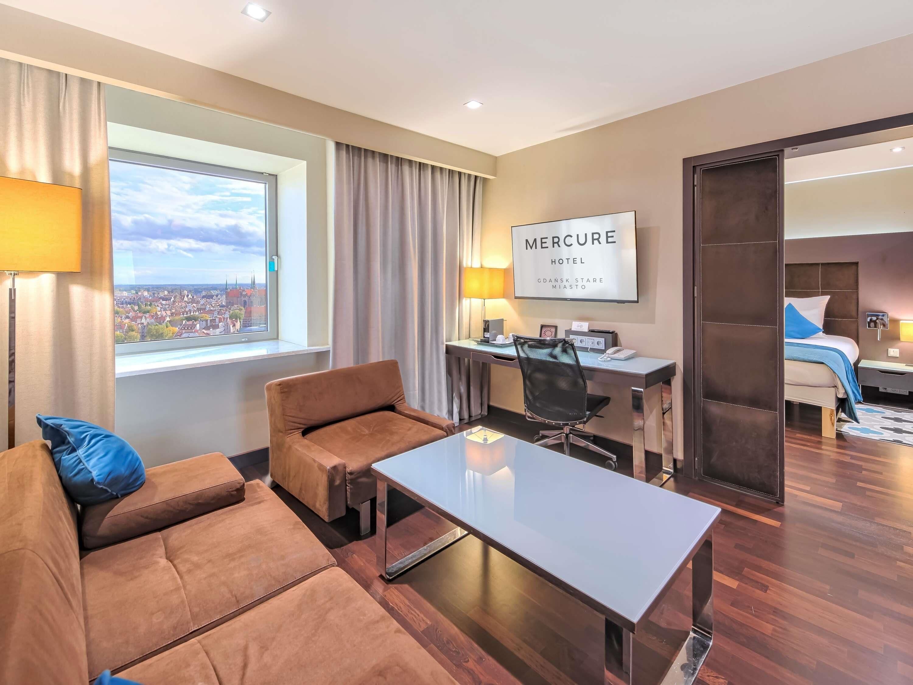 Suite, 1 cama de matrimonio | 1 dormitorio, minibar, caja fuerte y escritorio