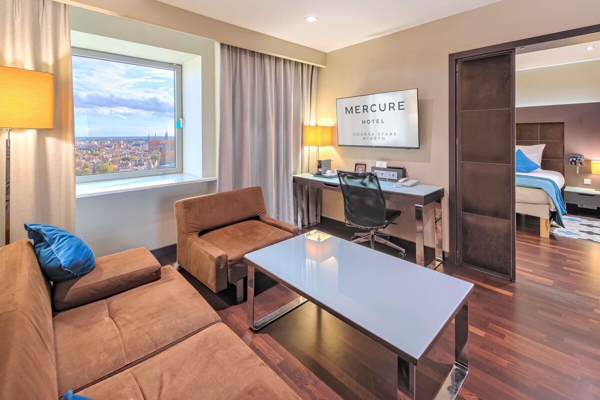 Suite, 1 cama de matrimonio | 1 dormitorio, minibar, caja fuerte y escritorio