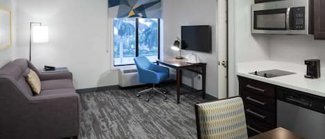 One Bedroom King Suite | In-room safe, desk, laptop workspace, blackout drapes