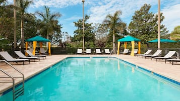 Outdoor pool, open 8:00 AM to 10:00 PM, free pool cabanas