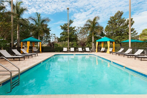 Outdoor pool, open 8:00 AM to 10:00 PM, free pool cabanas