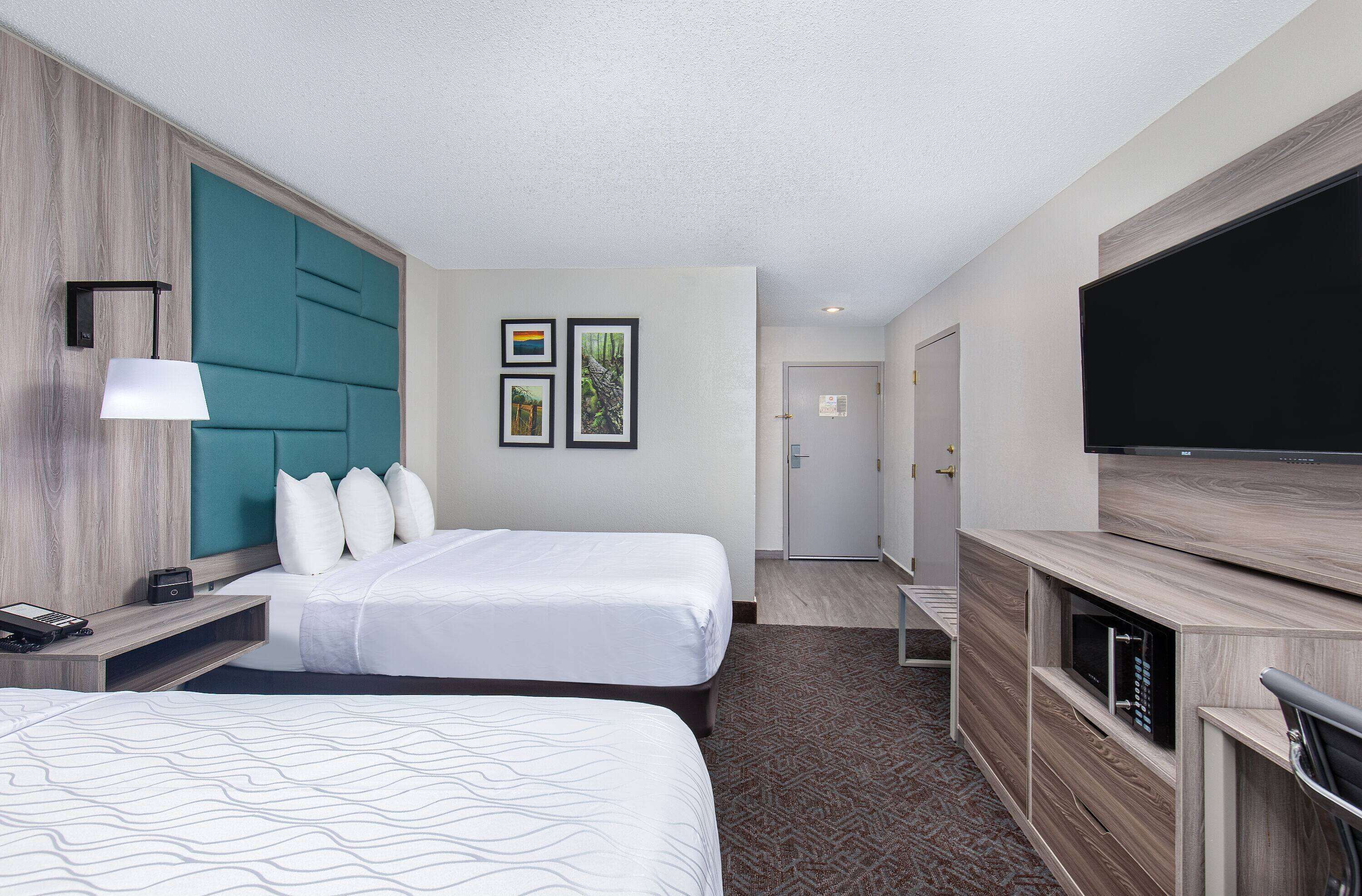 Room, 2 Queen Beds, Non Smoking | Premium bedding, in-room safe, desk, laptop workspace