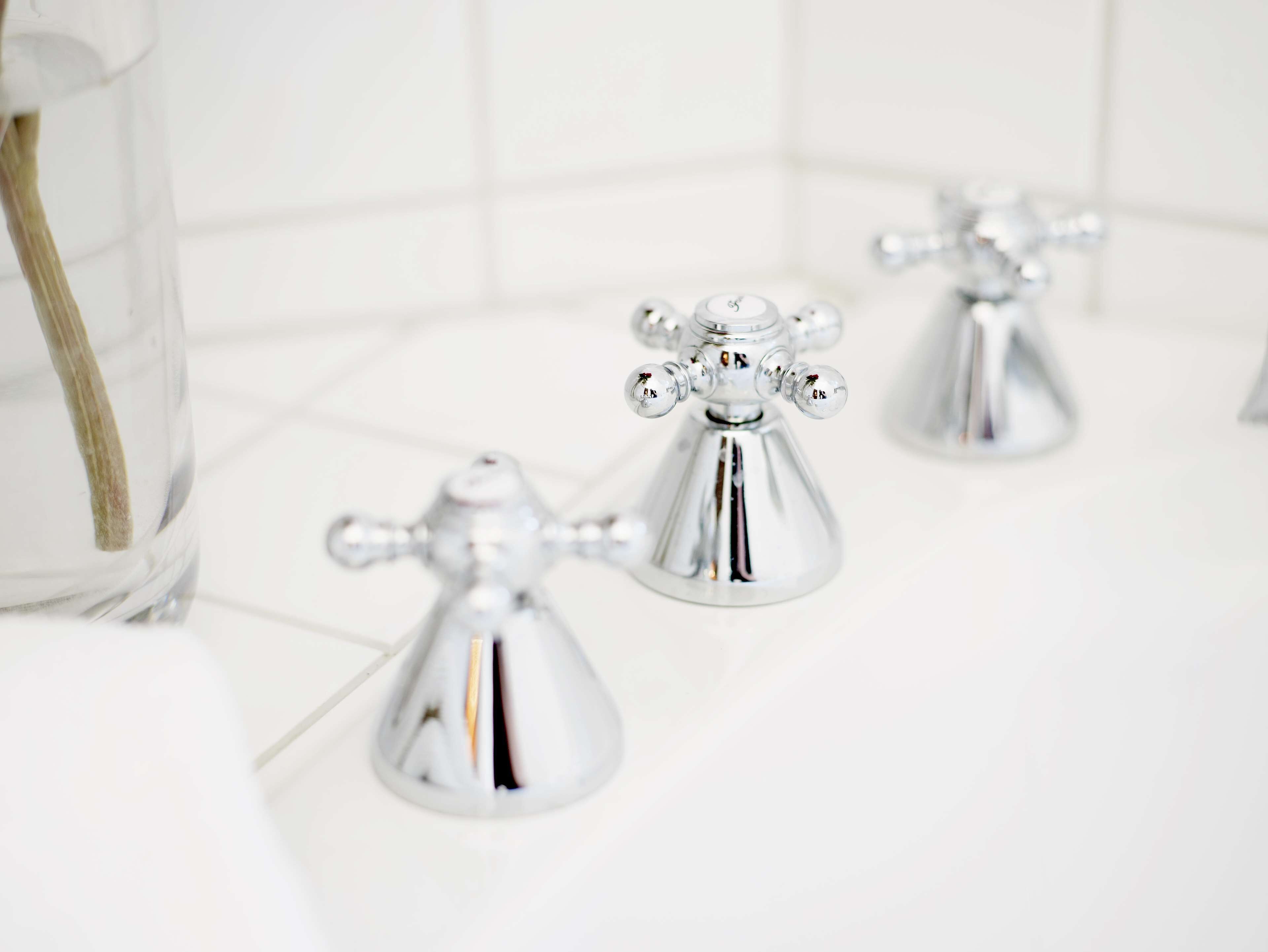 suite, 1 queen bed, non smoking, balcony (living room) | bathroom | hair dryer, slippers, towels