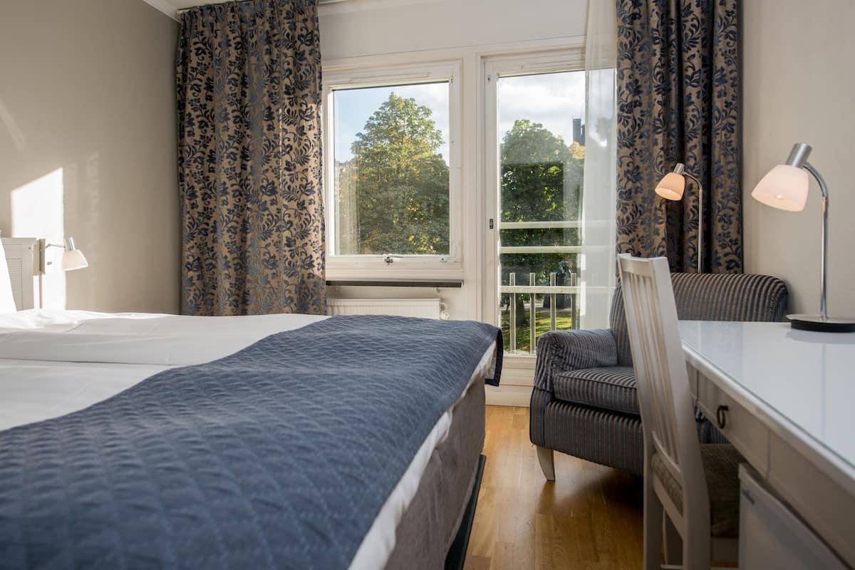 Double Room, Park View | In-room safe, desk, blackout curtains, iron/ironing board