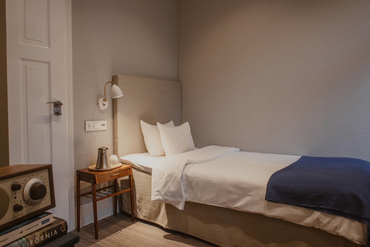 Compact Single, Annex Building | In-room safe, desk, blackout curtains, iron/ironing board