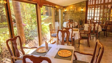 Breakfast, lunch served; international cuisine, al fresco dining