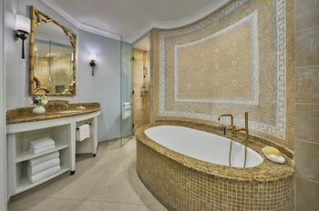 Combined shower/tub, designer toiletries, hair dryer, bathrobes at The Ocean Club, A Four Seasons Resort, Bahamas