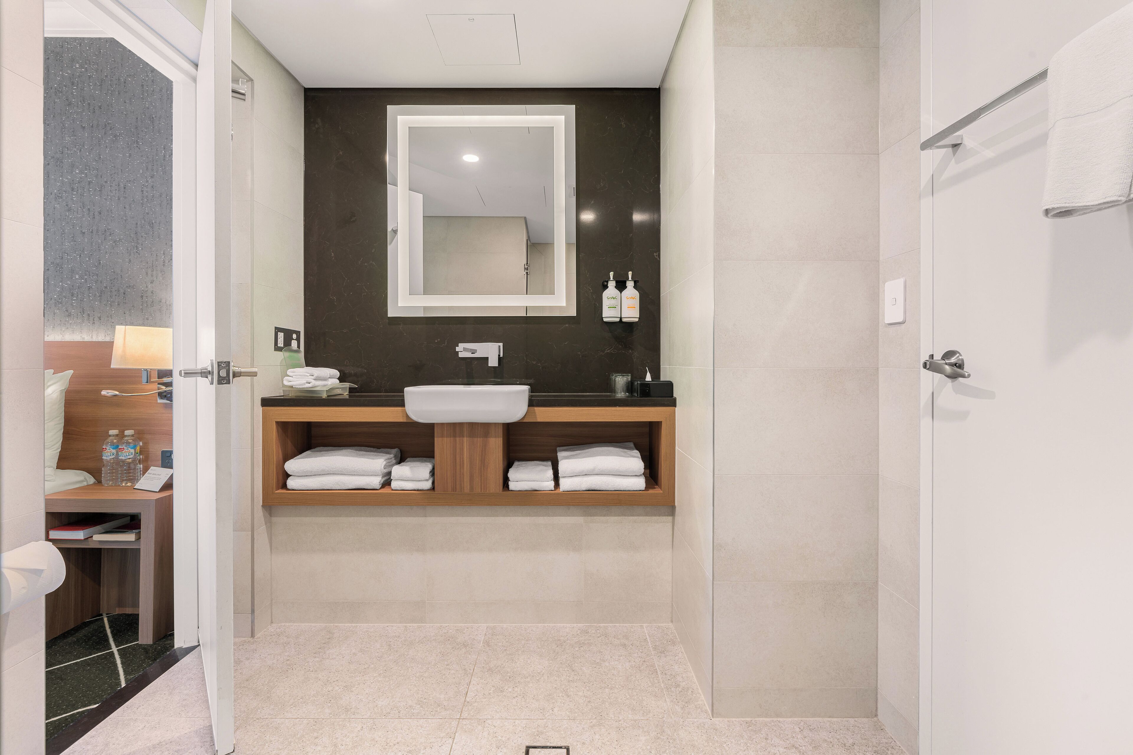 family suite | bathroom | eco-friendly toiletries, hair dryer, towels, soap