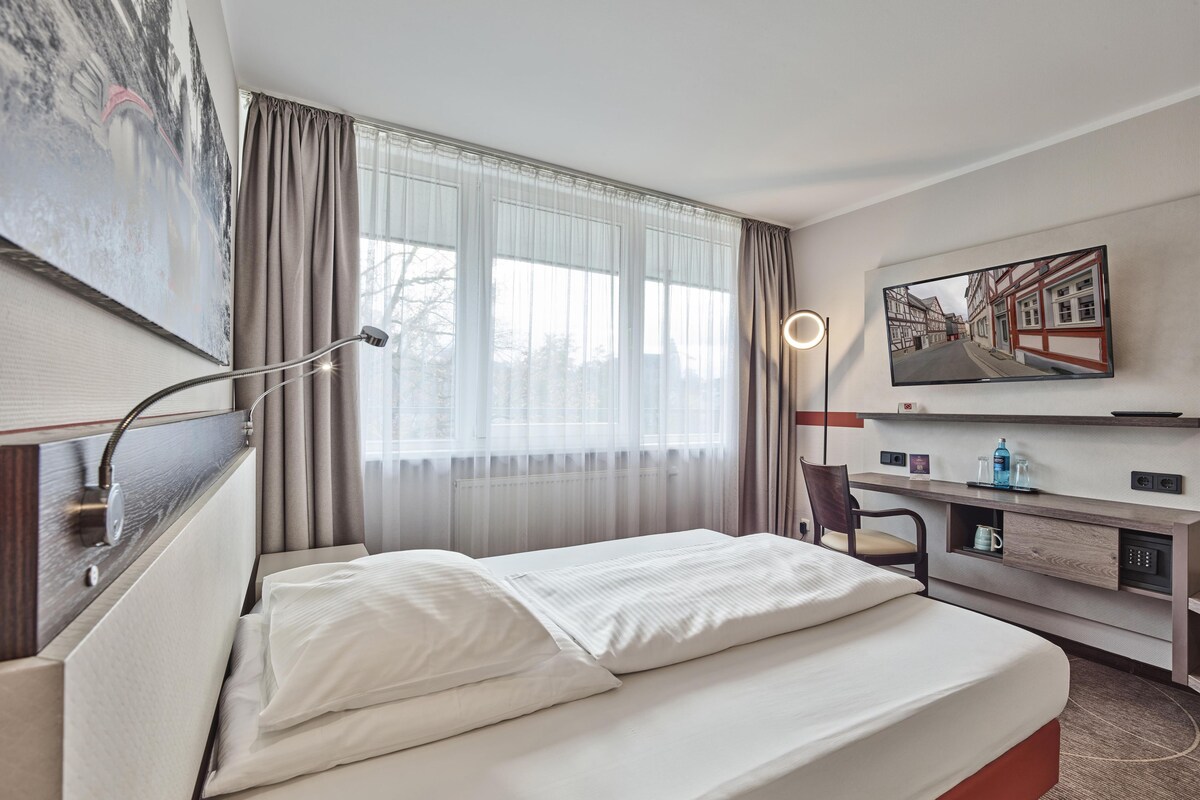 Hypo-allergenic bedding available, in-room safe, blackout drapes