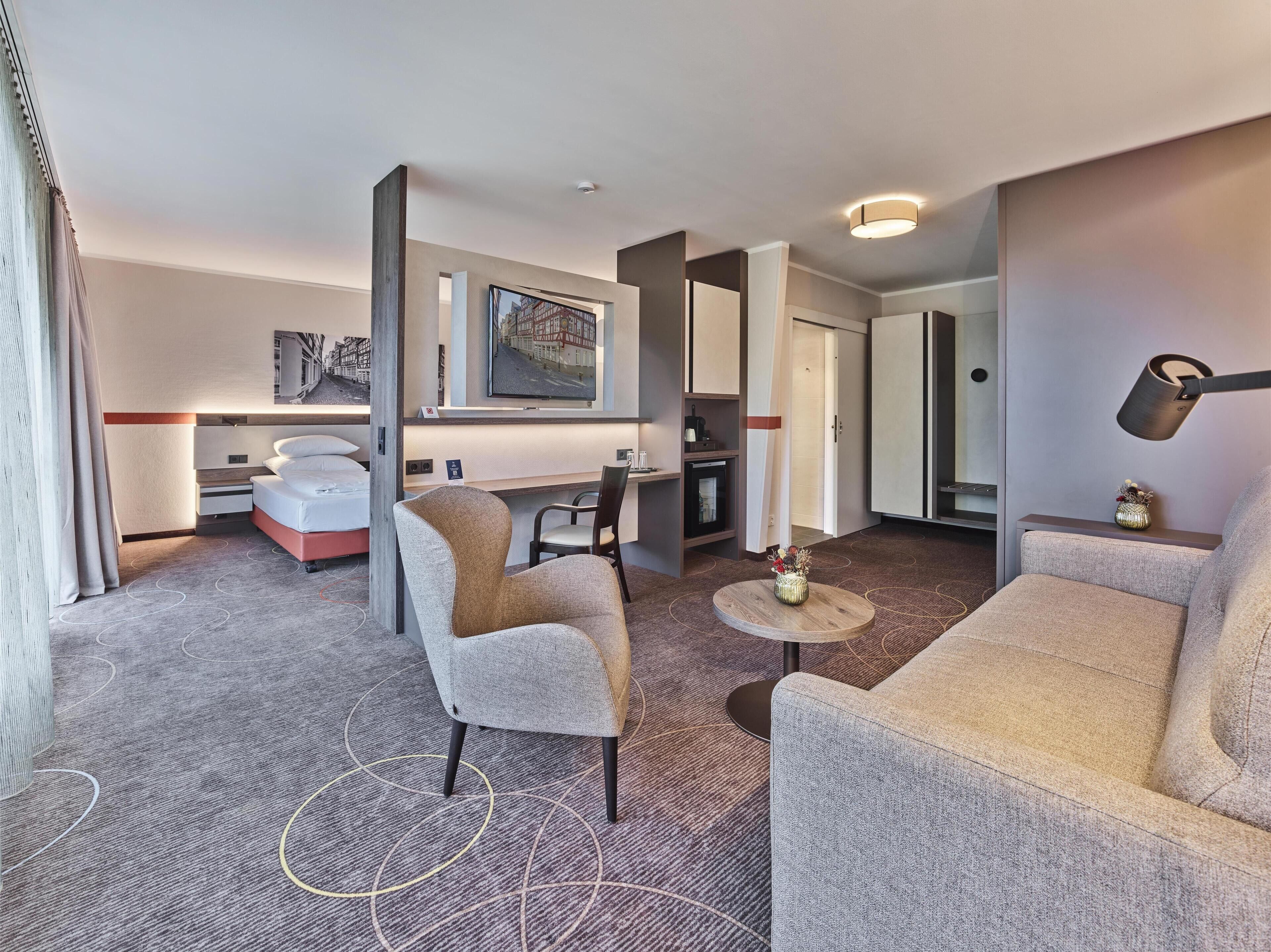 Suite, 2 camas individuales (Cozy Sitting Corner) | Ropa de cama hipoalergénica y caja de seguridad en la habitación 