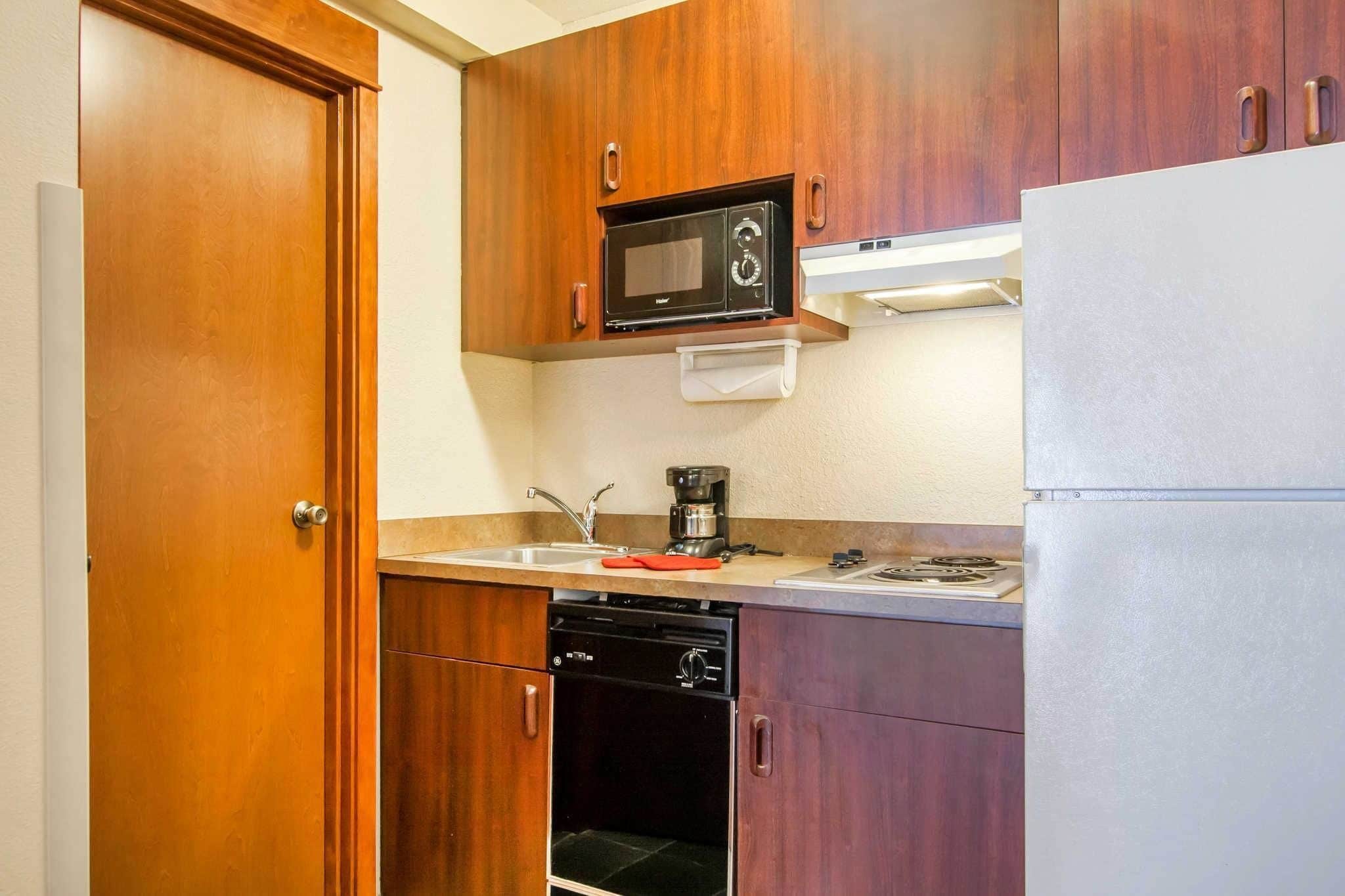 premium bedding, desk, blackout curtains, iron/ironing board